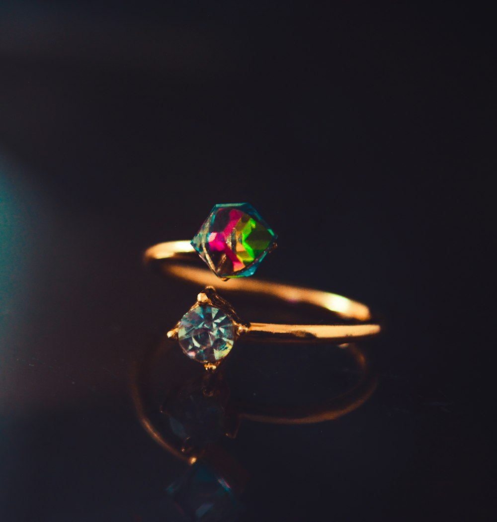 Curved ring with colorful stones