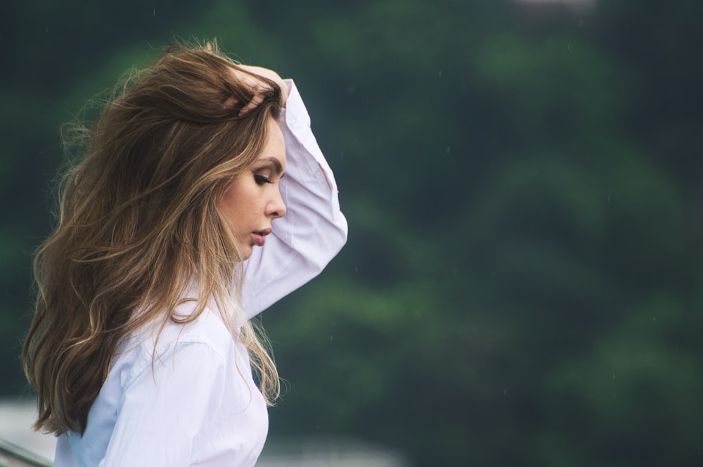 woman raising hand