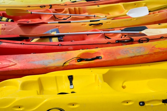 orange and yellow kayaks in Ciutadella de Menorca Spain