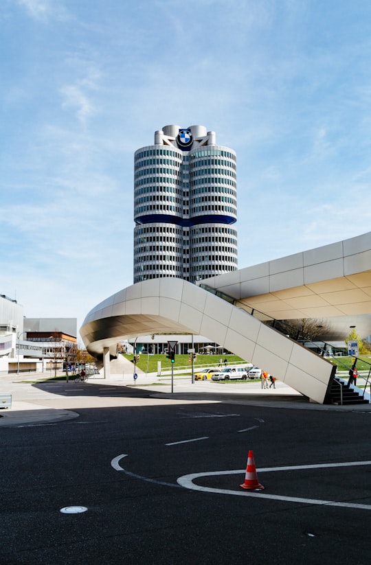 brown and white concrete building beside hallway in BMW Museum Germany