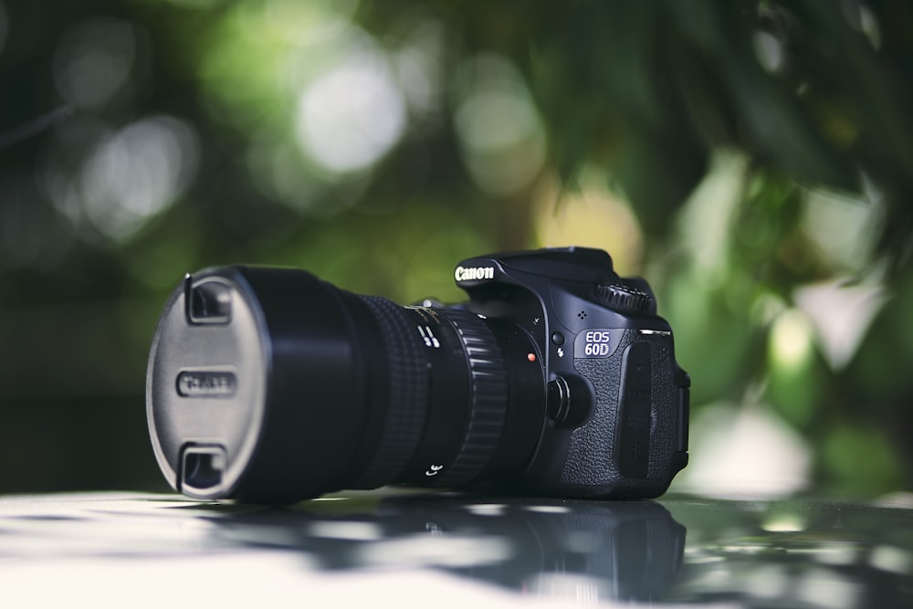 black Canon EOS 50D DSLR camera