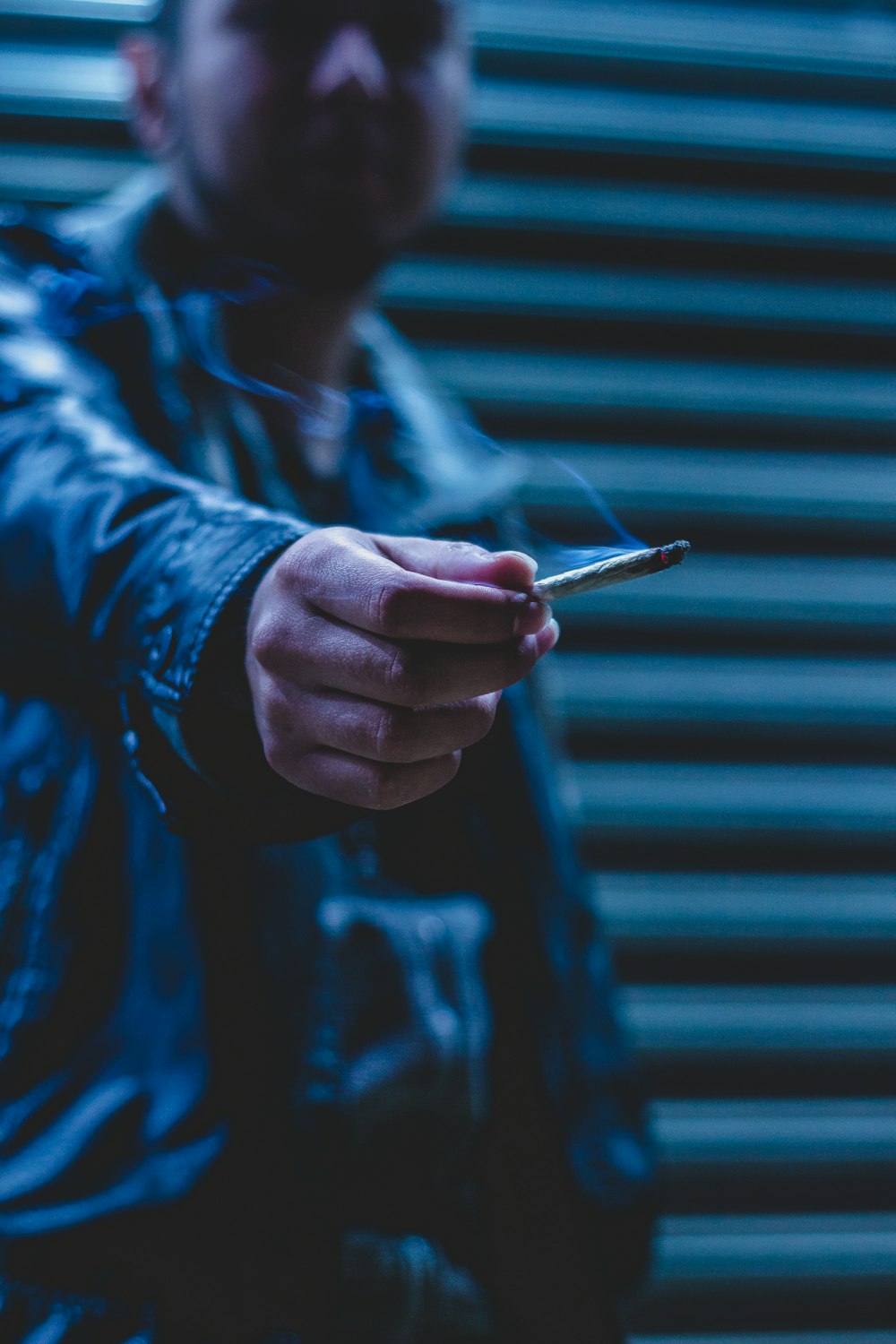 person holding joint