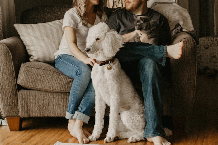 Orlando family relaxing at home with their dog and cat after a family-safe pest treatment