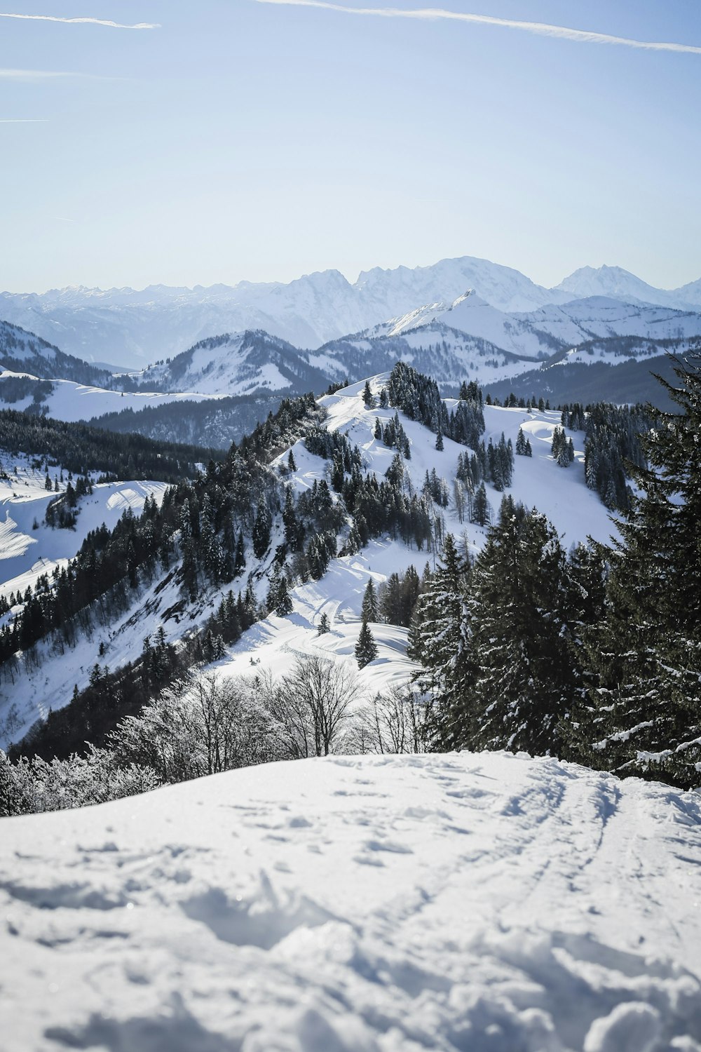 high-angle photography of snow coated mountains