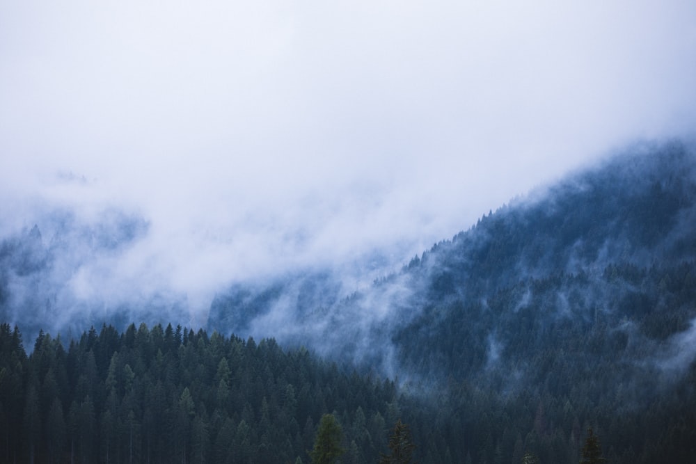 long exposure photography of clouds and mountain