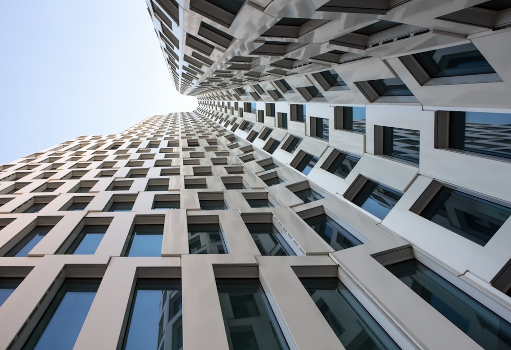 low angle photography of white high-rise building