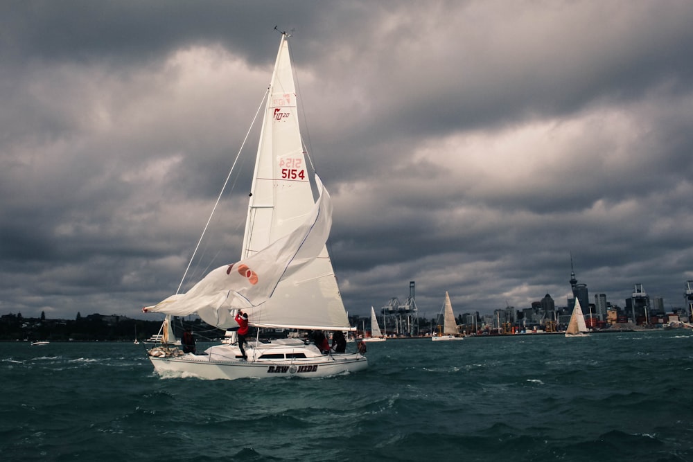 white sailboat on body of water