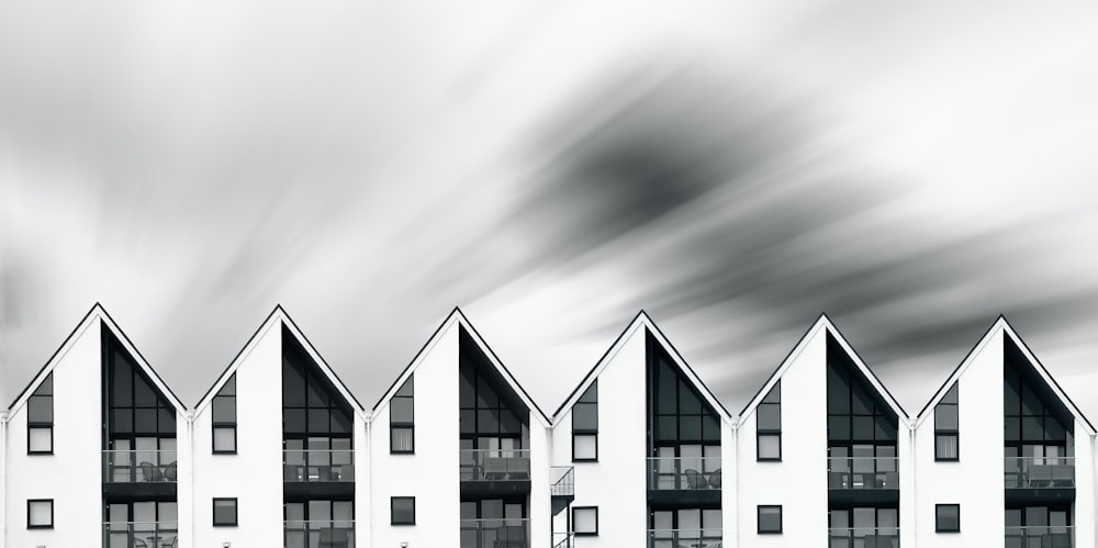a row of white buildings sitting next to each other