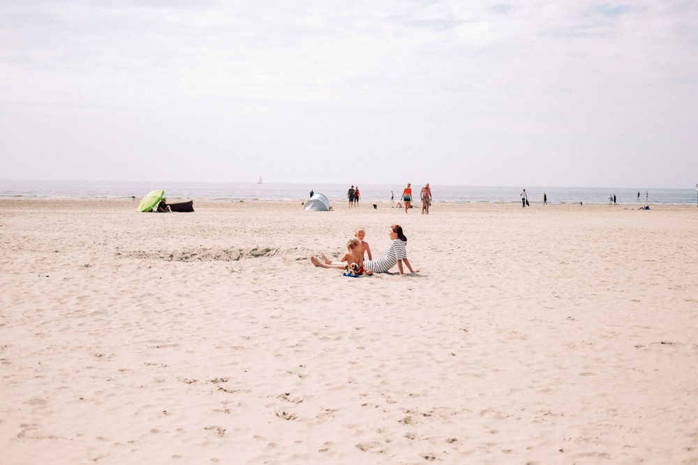 person laying on seashore\