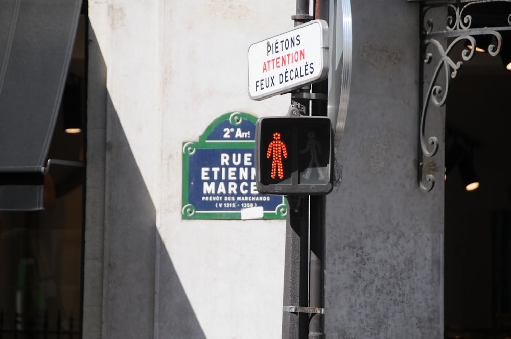 black metal street post with LED sign