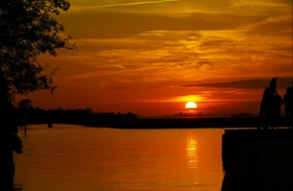 Evening sunset casting warm light over the calm waters by Campbell’s Landing.