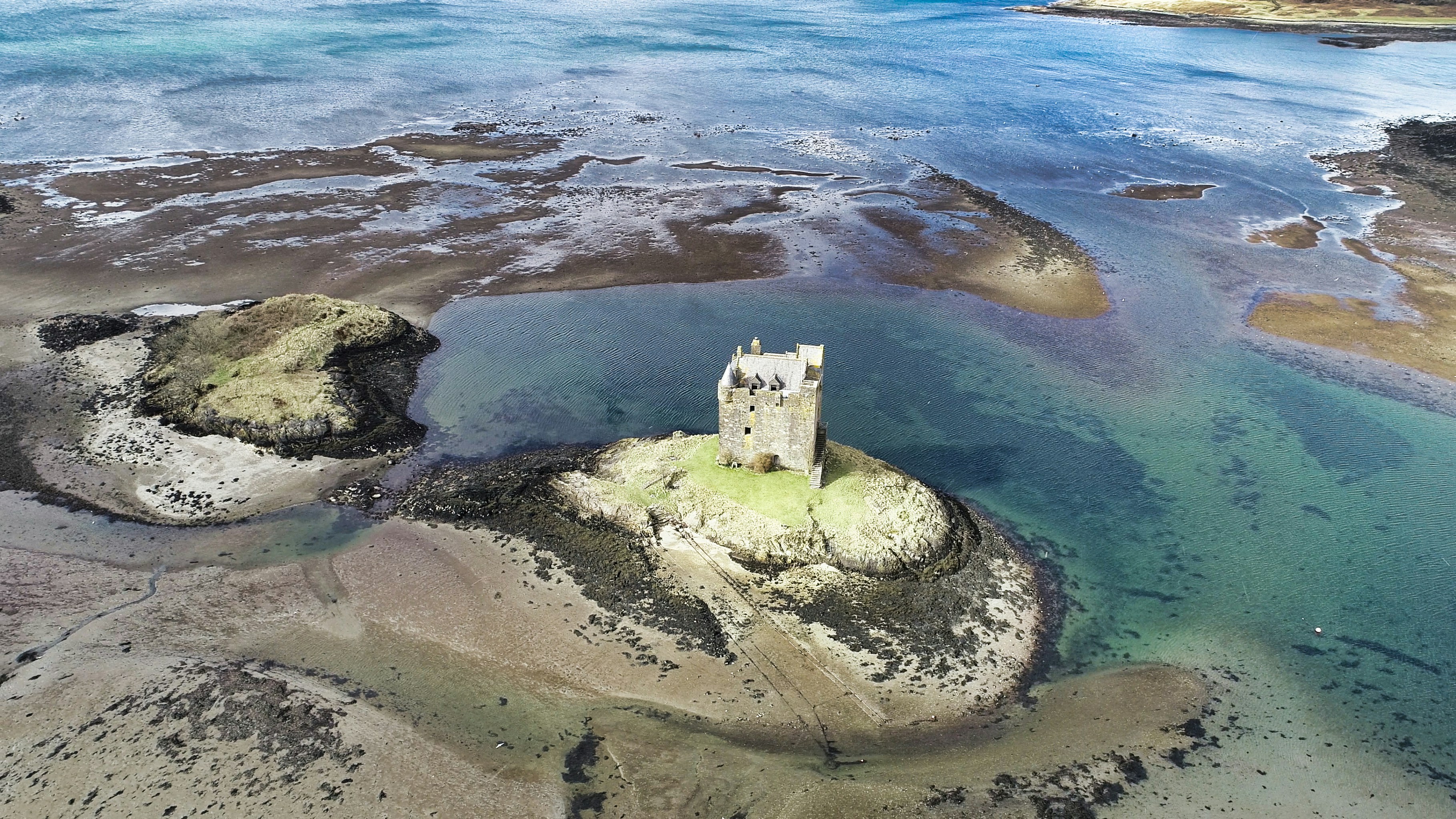 body of water under sunny sky, Castle Stalker, aka The Castle of Aaaaarrrrrrggghhh. As seen in Monty Python and the Holy Grail. No cows were hurt during this shoot.