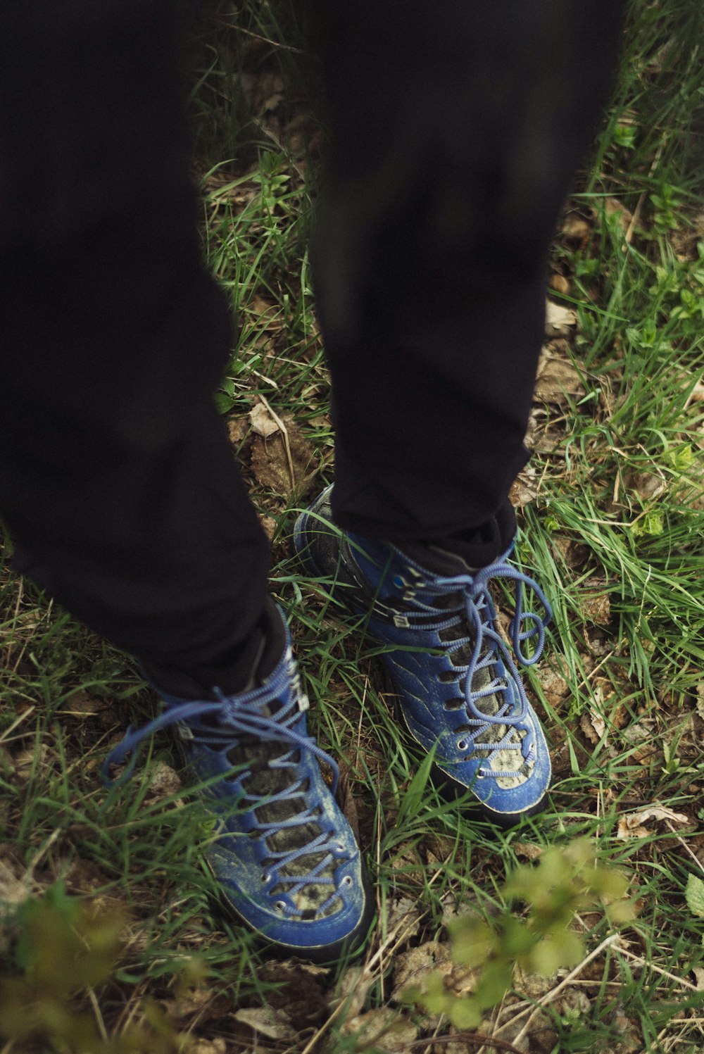 person standing on grass field