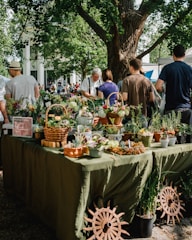 people beside assorted plants on table