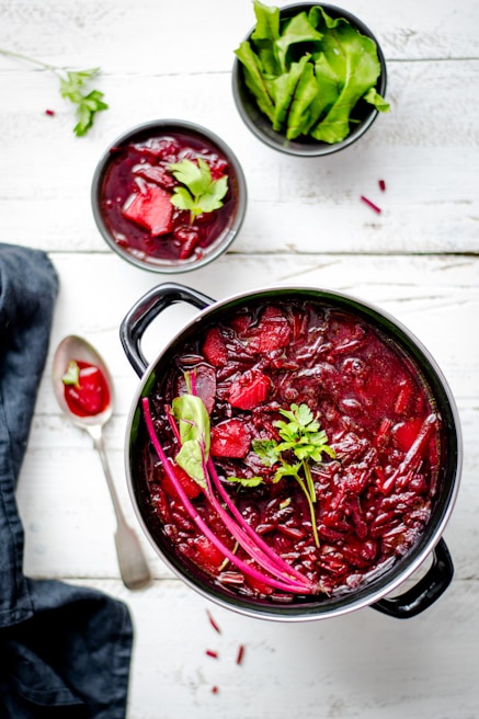 A close-up of a plate featuring borscht soup.