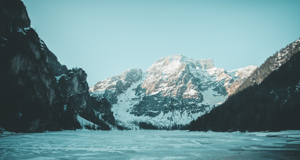 body of water near mountains