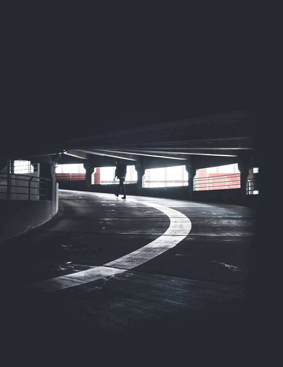 person walking on road