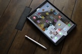 silver iPad with stylus
