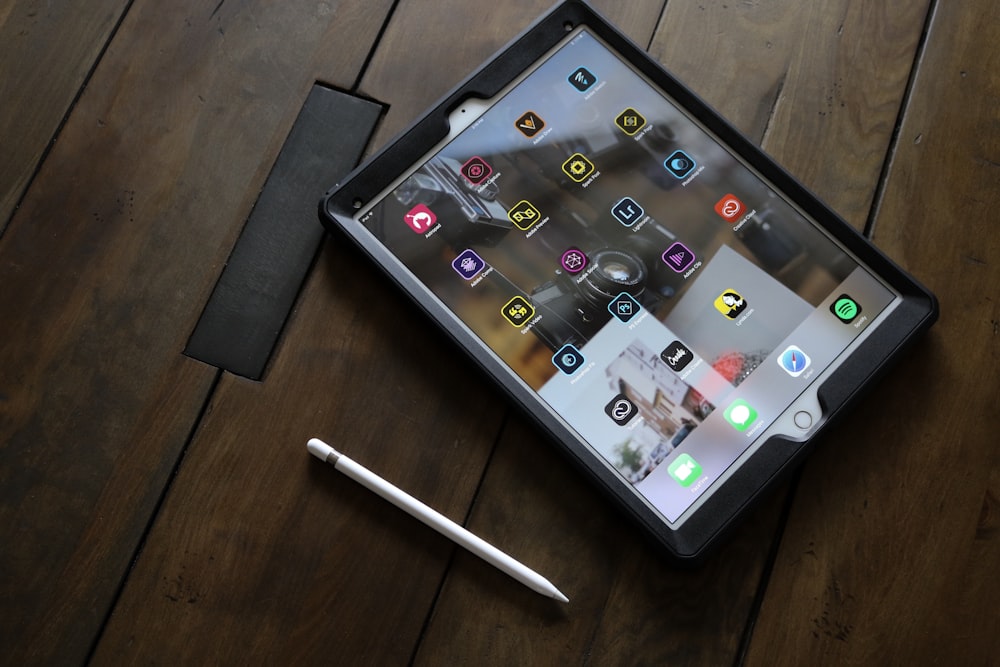 silver iPad with stylus