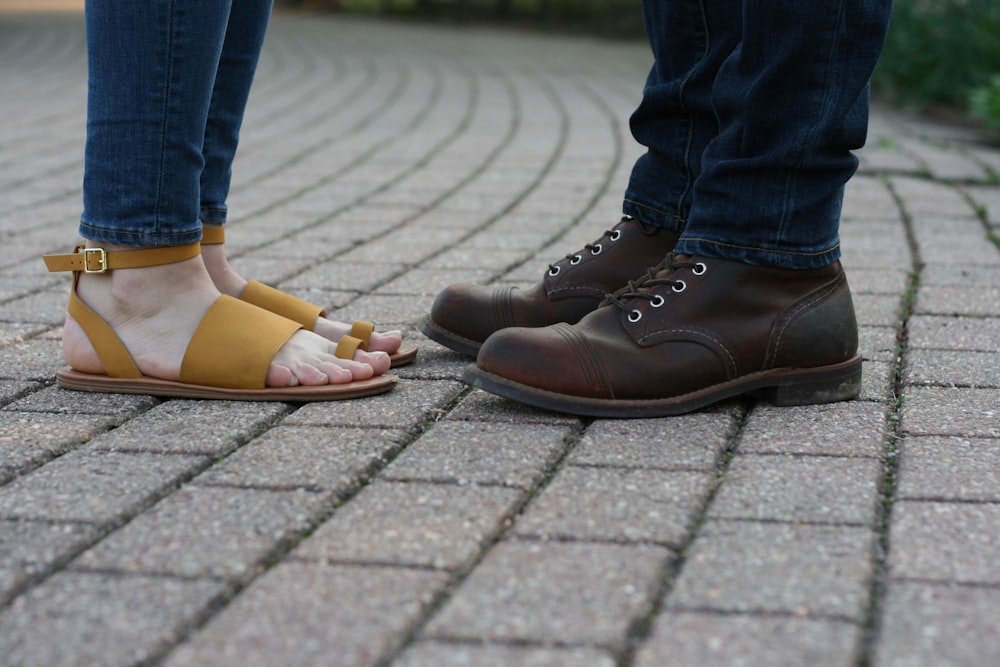 man standing in front of woman