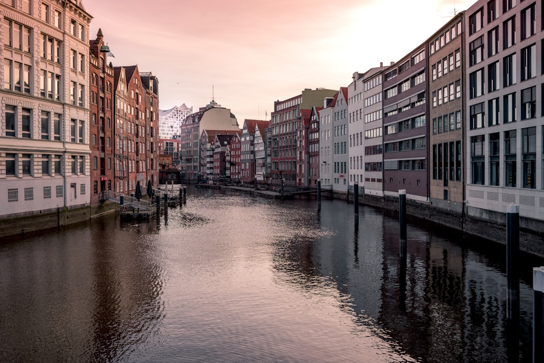 white and brown concrete buildings, Hamburg - houses next to river