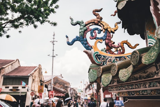 gray and multicolored decorative roof at daytime in George Town Malaysia