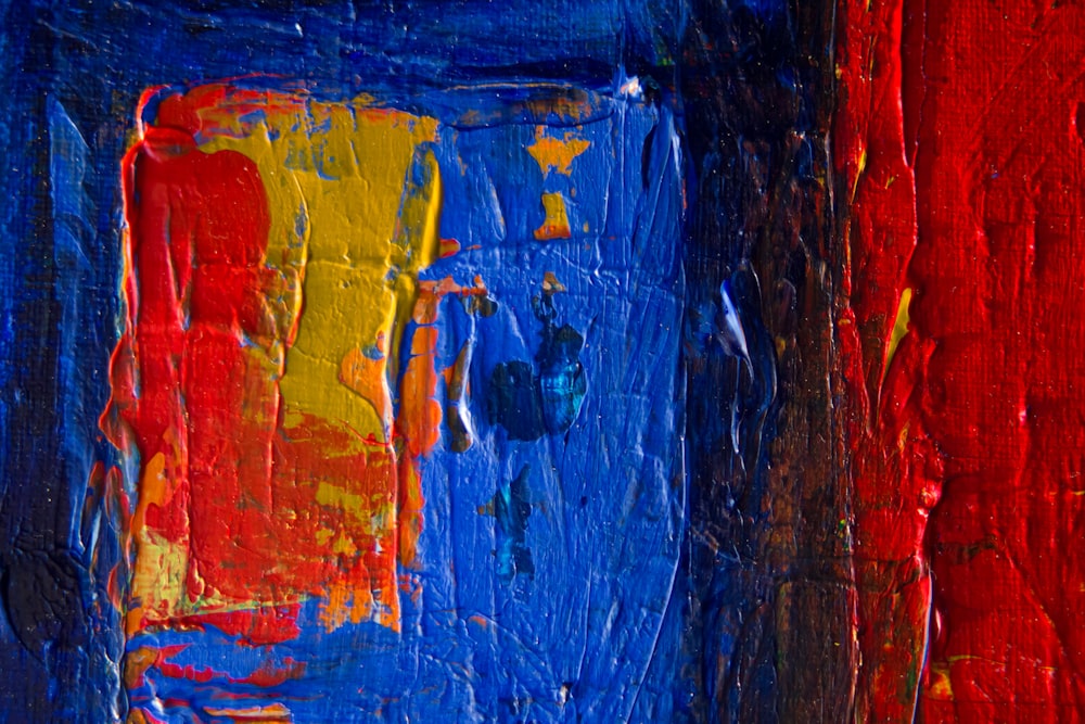 blue red and white abstract painting