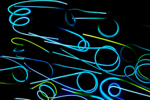 Abstract digital algorithm patterns glowing in neon green on black background.