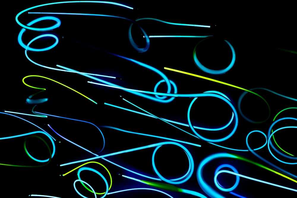 a black background with a bunch of neon lights