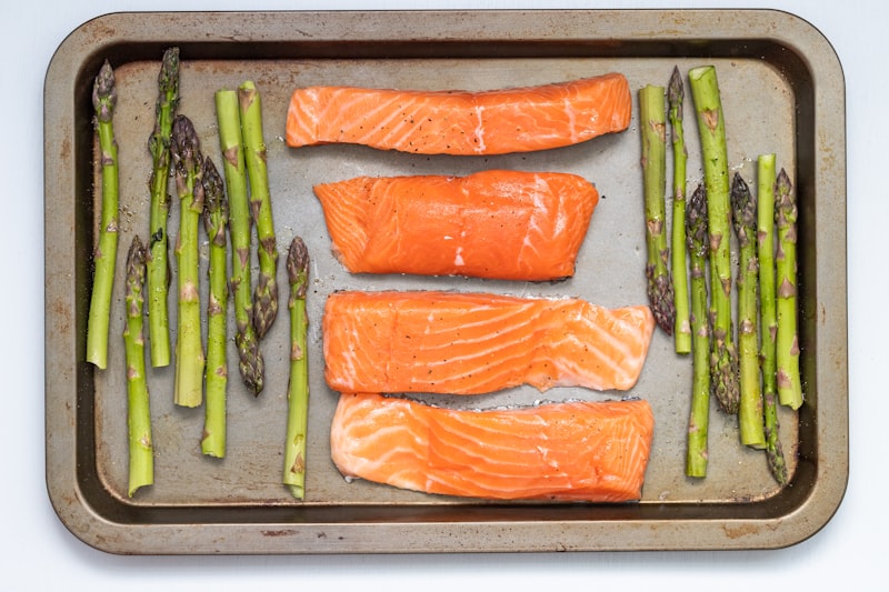 Salmon and asparagus were made for each other. The fact that they lend themselves naturally to a healthy, one-pan, weeknight dinner makes them a staple in my kitchen. They also sit right across from each other in the color wheel, making them permanently ready for their close up. from unsplash}