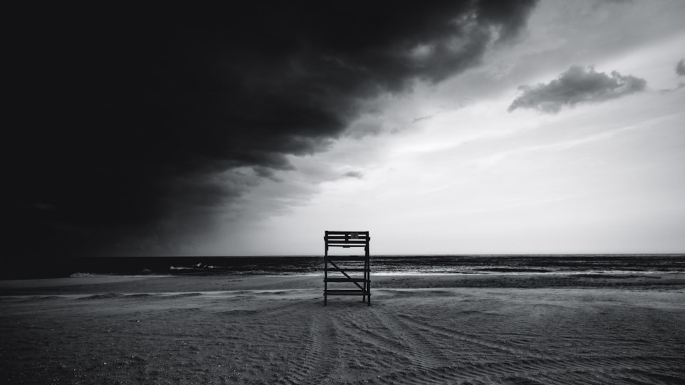 brown wooden rack on sand