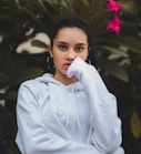 portrait photography of woman in white pullover hoodie