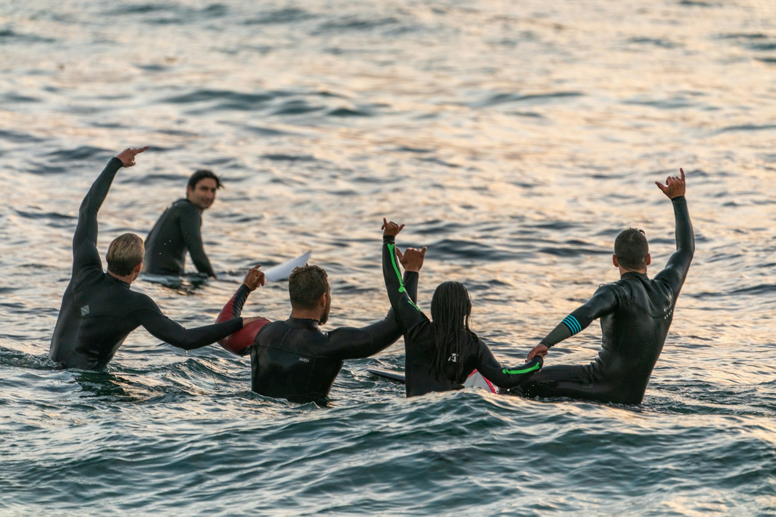 Sony a9 sample photo. People wearing black wetsuits photography