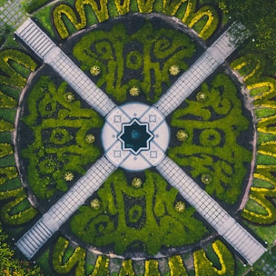 A well-laid out plotting scheme with marked plots and green spaces in Ahmedabad.