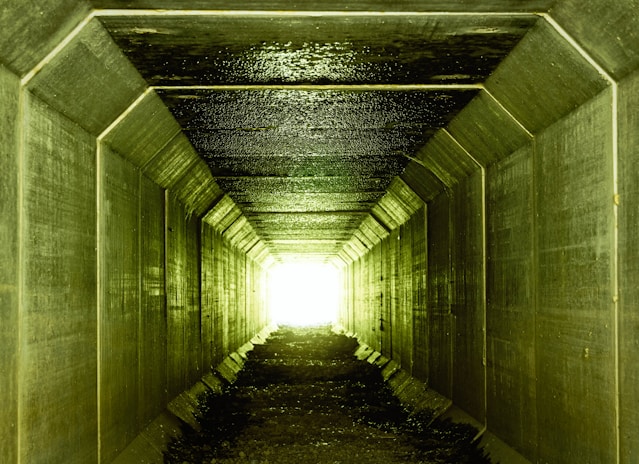 green painted wall tunnel