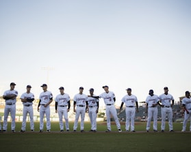 lined baseball players on field