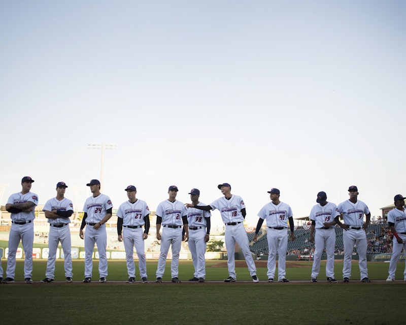baseball team training, Miyazaki stadium, baseball practice field, players in dugout, baseball uniform