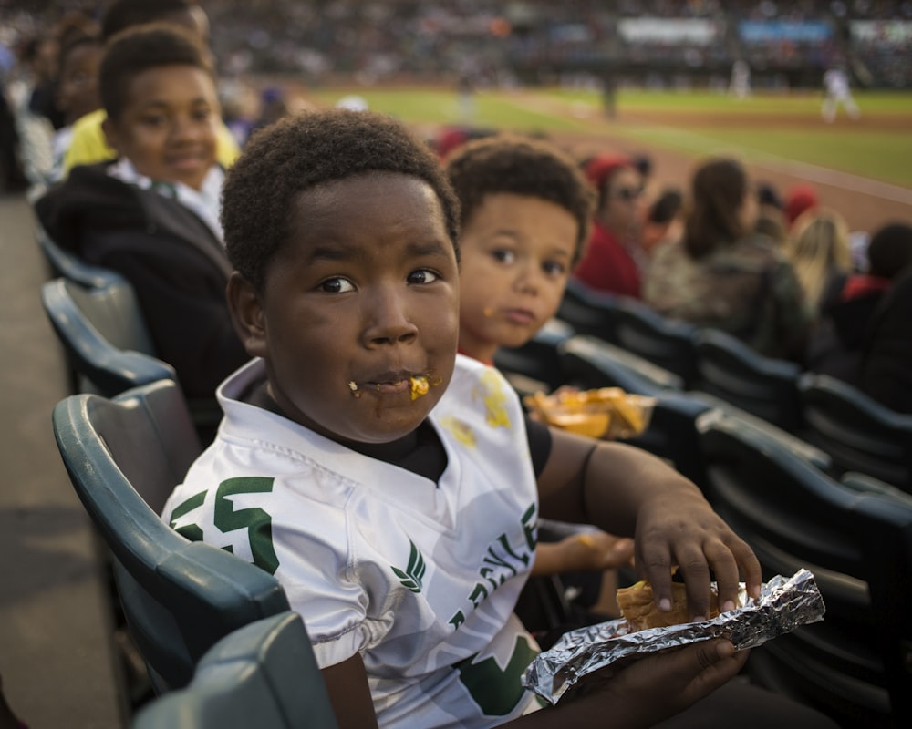 boy holding a food