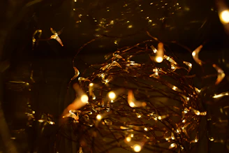 Colorful fairy lights glowing warmly in a cozy party corner.