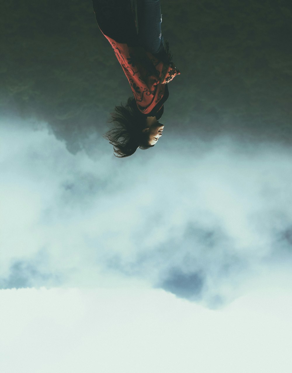 woman standing on mountain top during daytime