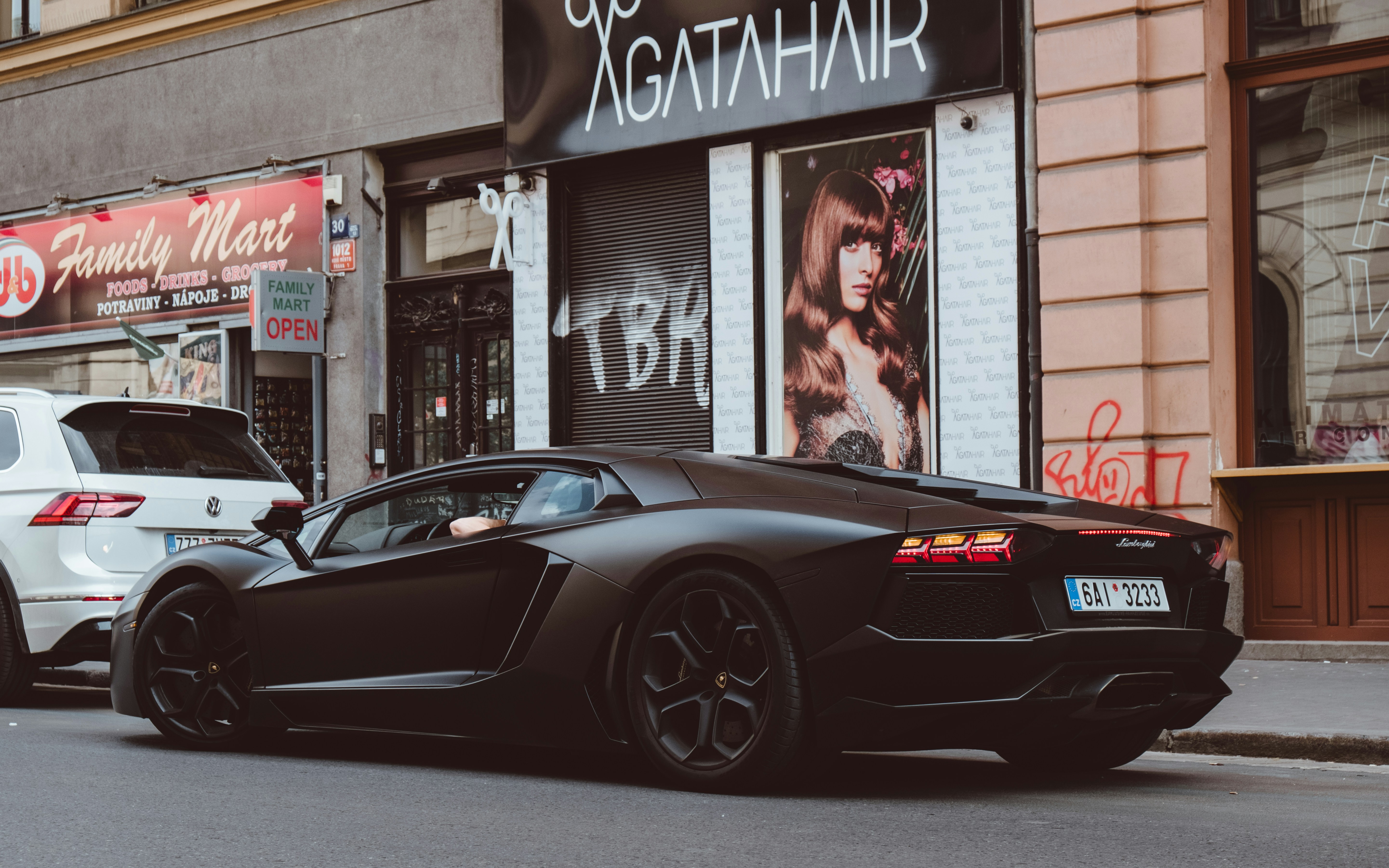 Matte black Lamborghini Aventador. I heard this very loud car coming from quite a distance, what a great sound! This is one of my favorite cars and I love the combination of the matt black color and the black rims. It gives this car such an aggressive look. Saw this last weekend in Prague, Czech Republic.