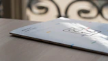 Stack of official-looking reports and publications with the Kalkınma Vizyonu logo on the cover.