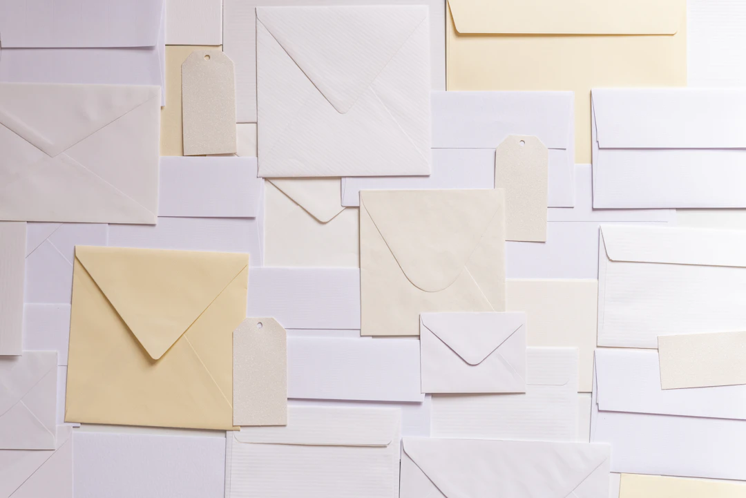 A wall of envelopes and mail