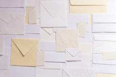 A stack of paper envelopes