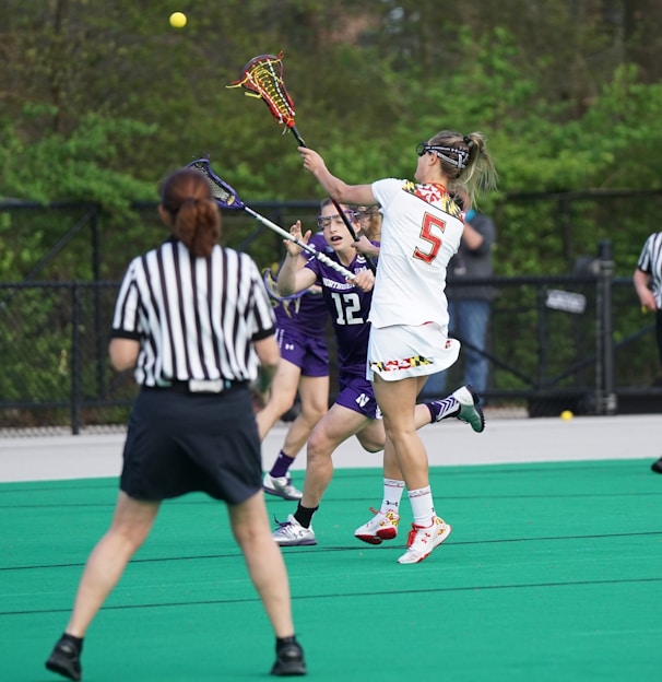 women playing lacrosse