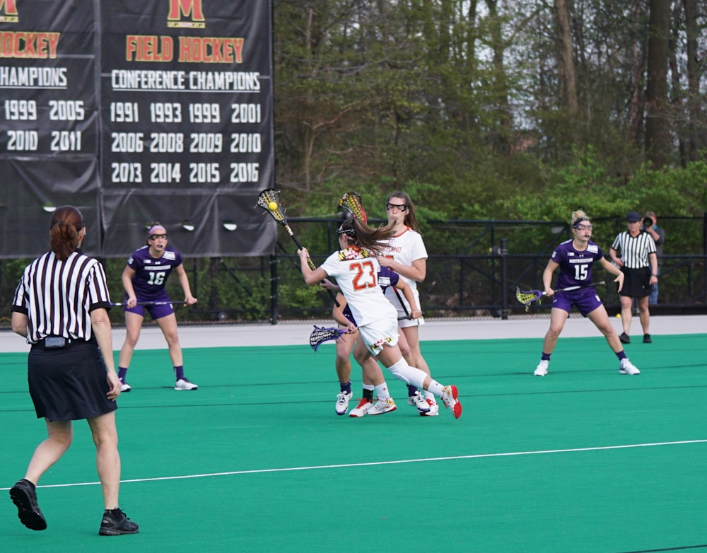 women playing lacrosse