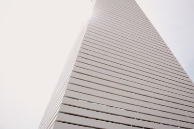 white high-rise building during day seaside google meet background