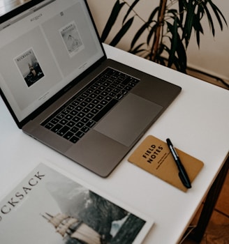 MacBook Pro on white table