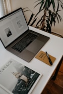 MacBook Pro on white table