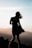 silhouette of woman on hill top view